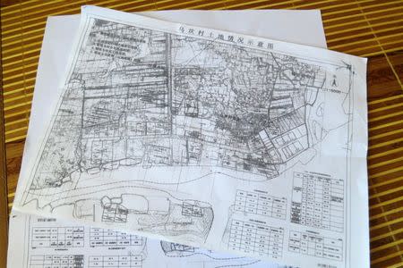 A blueprint of disputed Wukan land is seen in Wukan village in the southern province of Guangdong, China June 23, 2016. Picture taken June 23, 2016. REUTERS/James Pomfret