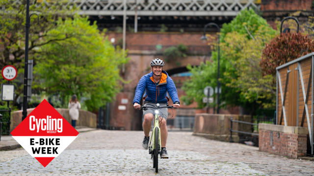  Male cyclist riding an electric bike 