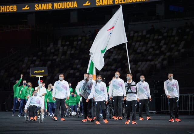 Abbas Karimi, right, and Alia Issa launched the procession of nations at the opening ceremony by leading out the six-strong Refugee Paralympic Team