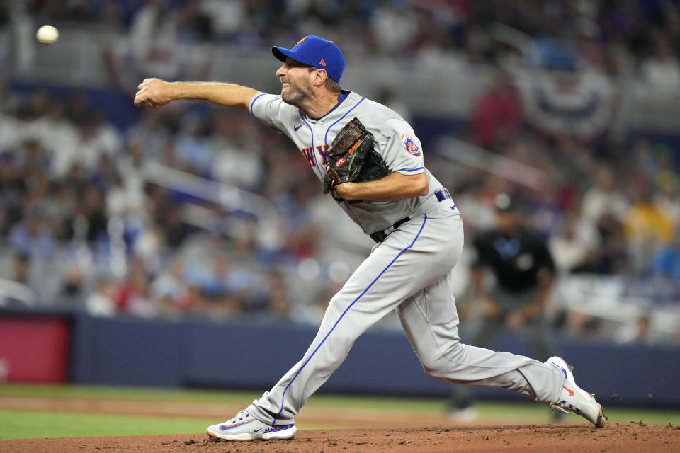 New York Mets starting pitcher Max Scherzer throws during the first inning of an opening day baseball game against the Miami Marlins, Thursday, March 30, 2023, in Miami. (AP Photo/Lynne Sladky)