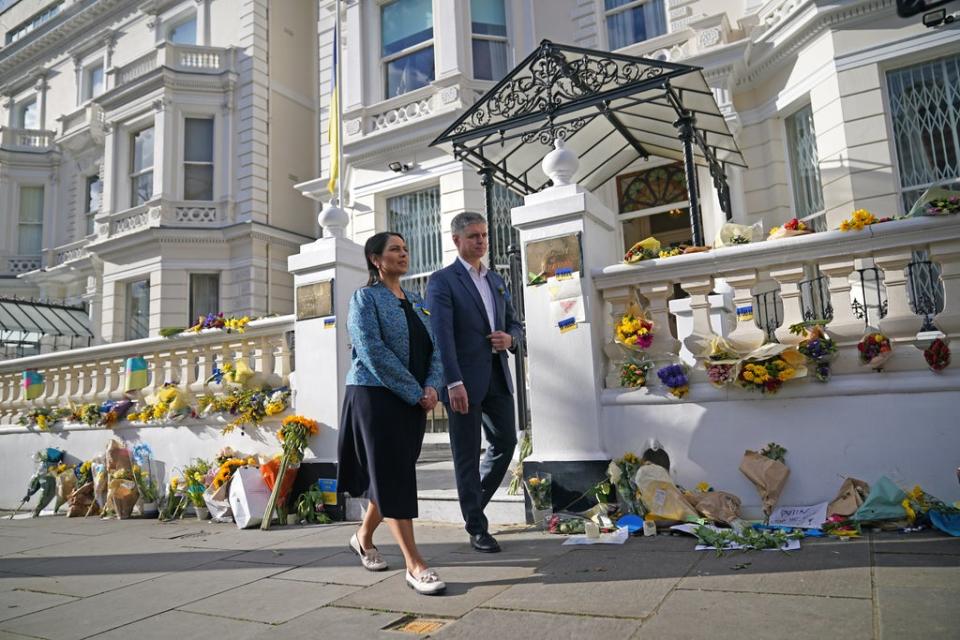 Ambassador of Ukraine to the UK, Vadym Prystaiko with Home Secretary Priti Patel outside the Ukrainian embassy in London on Sunday (Yui Mok/PA) (PA Wire)