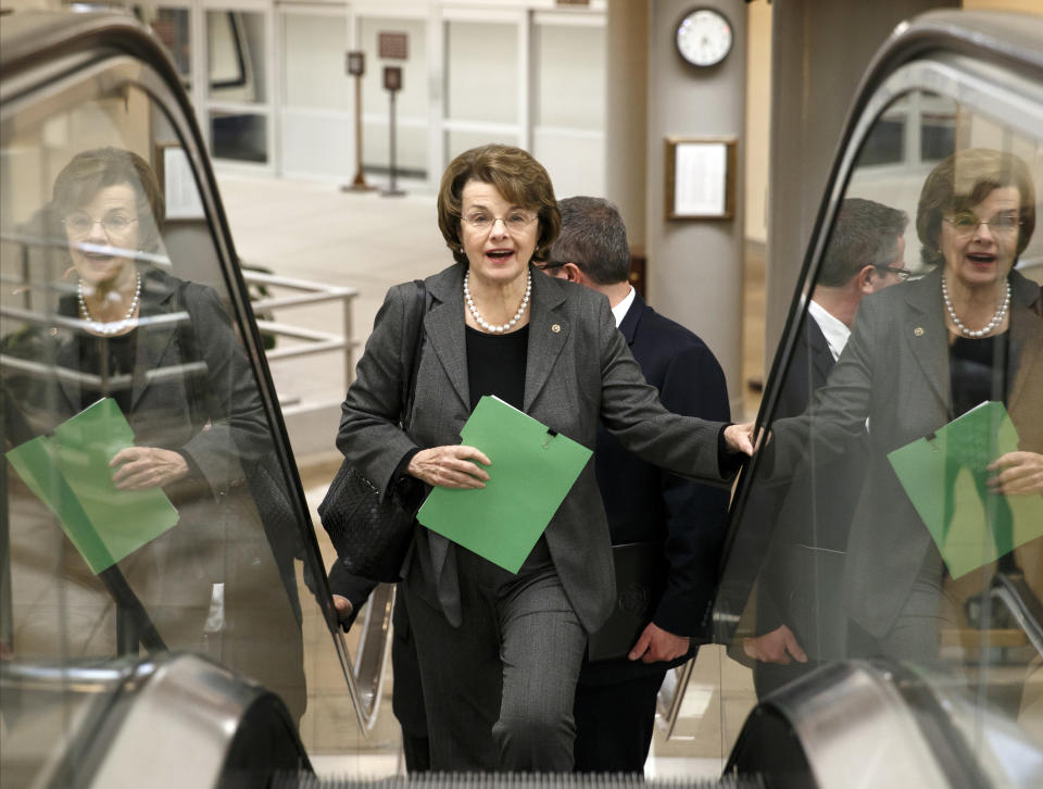 FILE - U.S. Sen. Dianne Feinstein, D-Calif., chair of the Senate Intelligence Committee, heads to the chamber to advance a bill providing $1 billion in loan guarantees to Ukraine as President Barack Obama meets with U.S. allies in Europe to punish Moscow for its annexation of the Crimean peninsula, at the Capitol in Washington, Monday, March 24, 2014. (AP Photo/J. Scott Applewhite, File)