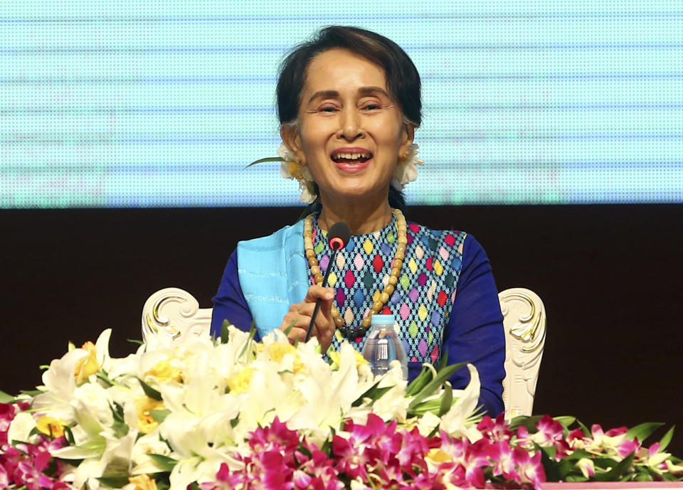 Myanmar's Leader Aung San Suu Kyi delivers a speech during the meeting with the country's business leaders at the Myanmar International Convention Center in Naypyitaw, Myanmar, Monday, Aug. 27, 2018. Investigators working for the U.N.'s top human rights body say top Myanmar military leaders should be prosecuted for genocide against Rohingya Muslims. (AP Photo/Aung Shine Oo)