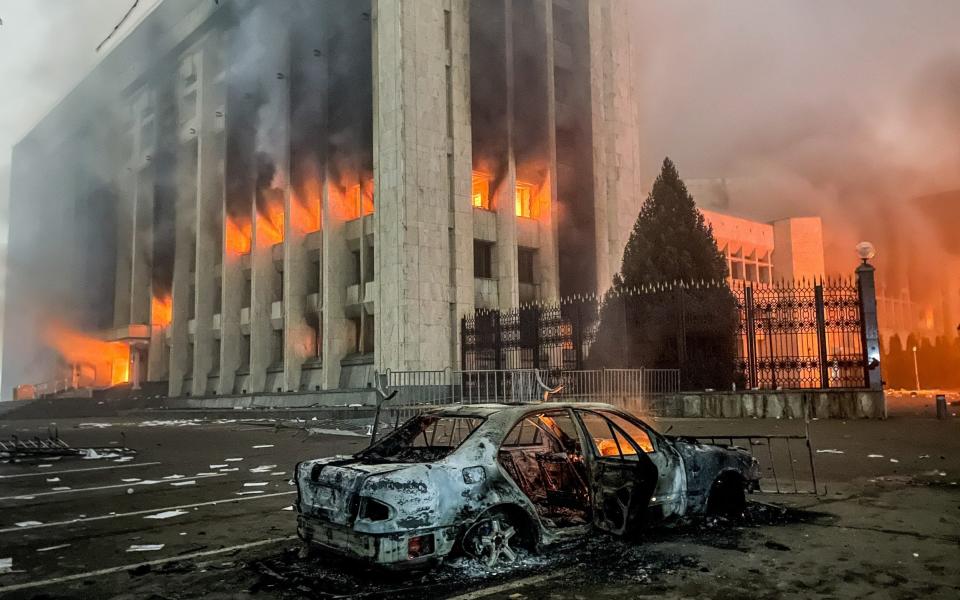 Protesters broke into the Almaty mayor's office and set it on fire - Valery Sharifulin\\TASS via Getty Images