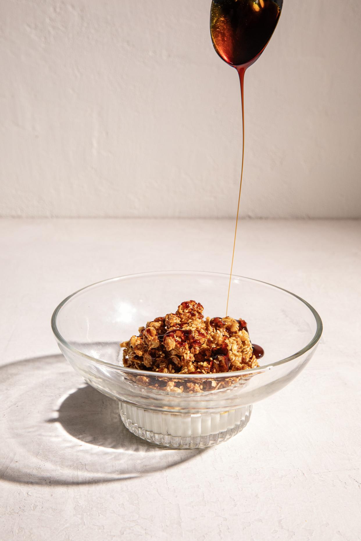 Chef Chris McClendon's "Sexy Breakfast" cookbook introduces an elevated take on breakfast staples, such as homemade granola with a drizzle of honey.