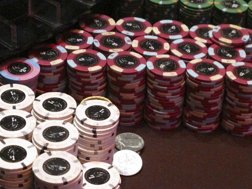 Chips sit on a roulette table at the Golden Nugget casino in Atlantic City N.J., on Feb. 22, 2019. With large numbers of high school students saying they are already gambling with friends or online before they are old enough to do so legally, several states are moving to require classes on the risks of gambling as part of high school curriculum. (AP Photo/Wayne Parry)