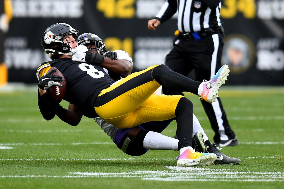 Kenny Pickett of the Pittsburgh Steelers is sacked by Roquan Smith of the Baltimore Ravens. (Photo by Joe Sargent/Getty Images)