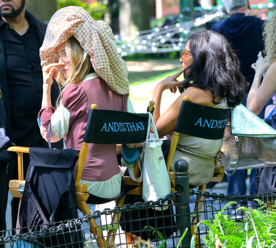Sarah Jessica Parker and Nicole Ari Parker sit on "And Just Like That" set chairs, facing away