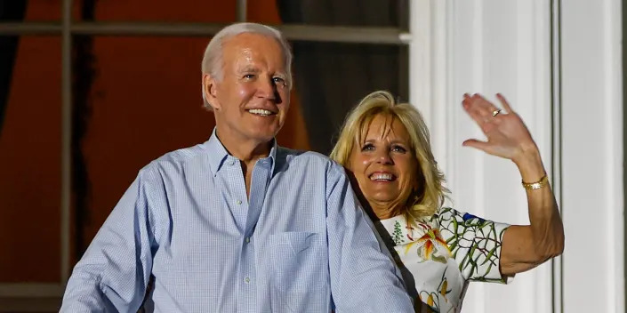 U.S. President Joe Biden and first lady Jill Biden watch fireworks go off on national mall from the White House on July 04, 2022 in Washington, DC. U.S.