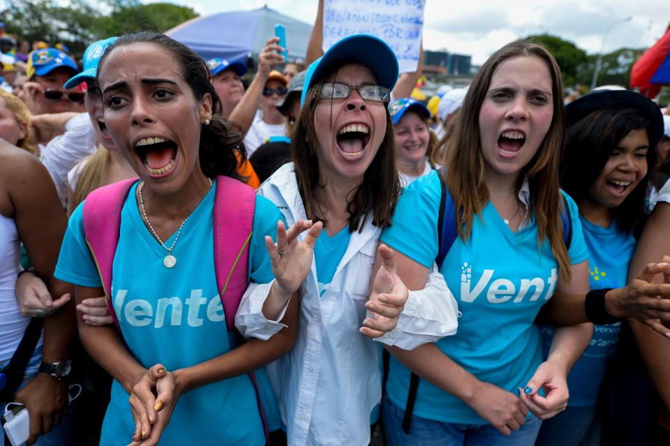 Women shout slogans against President Nicolas Maduro's government, during a demonstration in Caracas on Oct. 22, 2016.&nbsp;