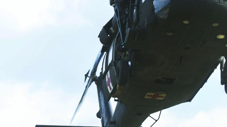 Troops are hoisted up by a UH-60 Black Hawk flown by Nebraska National Guardsmen during a drill used to practice evacuation in a contested environment. (Sgt. Dustin Stewart/U.S. Army National Guard)