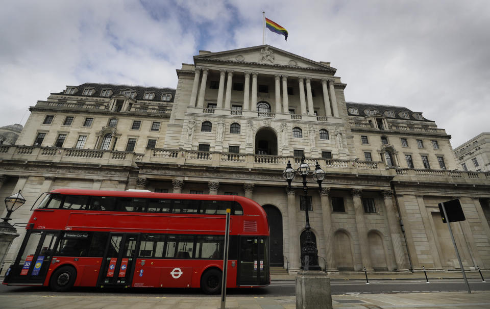 The rainbow flag flies above the Bank of England to celebrate the unveiling of the new fifty pound note in London, Thursday, March 25, 2021. The new £50 banknote features the scientist Alan Turing. Following its public unveil today, the polymer £50 will be issued for the first time on June 23, 2021, which coincides with Alan Turing's birthday. (AP Photo/Kirsty Wigglesworth)