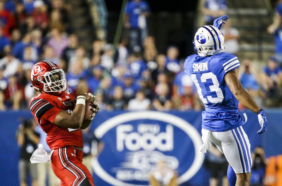 Utah defensive back Julian Blackmon makes an interception on a pass intended for BYU wide receiver Micah Simon at LaVell Edwards Stadium in Provo on Thursday, Aug. 29, 2019. Blackmon returned the pick for a touchdown. | Colter Peterson, Deseret News