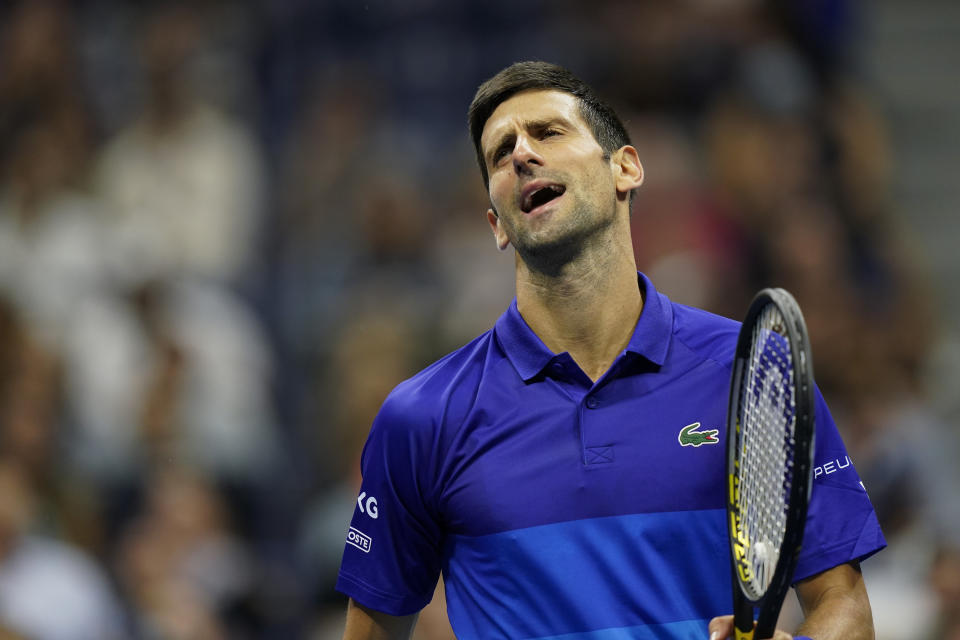 Novak Djokovic, of Serbia, reacts after missing a shot against Tallon Griekspoor, of the Netherlands, during the second round of the US Open tennis championships, Thursday, Sept. 2, 2021, in New York. (AP Photo/Frank Franklin II)