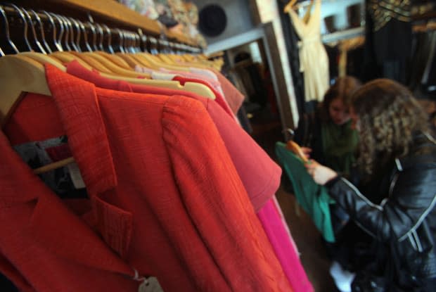 Shoppers browse a vintage clothing store in Ottawa, Canada. 