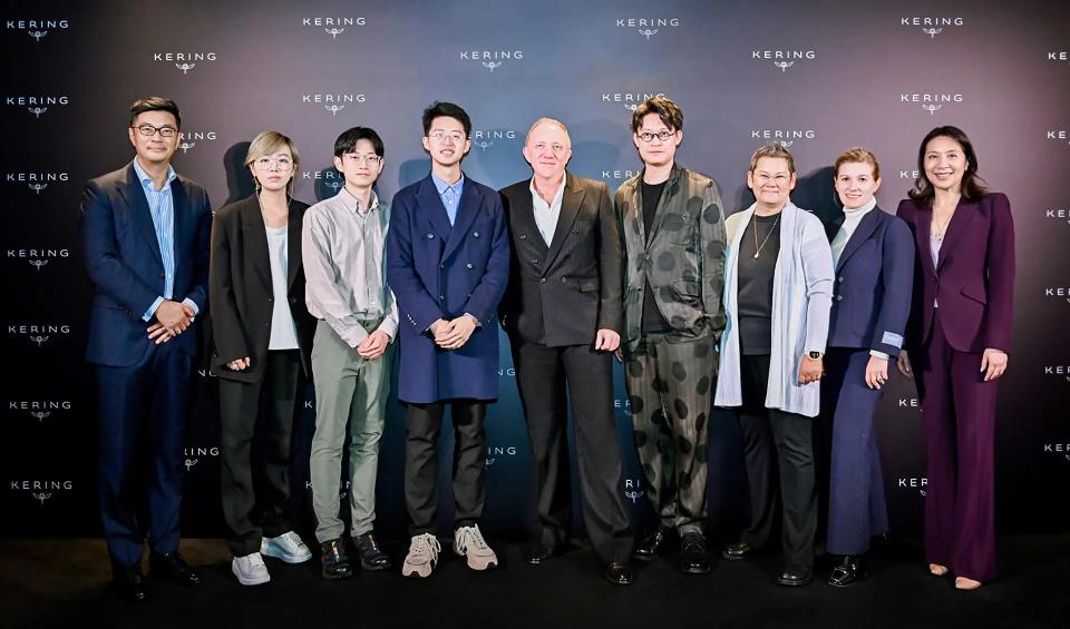 From left: Jieping Xu, Yi Yan, Mingkai Cao, Yuxuan Lan, François-Henri Pinault, Yi Yin, Yi Zheng, Marie-Claire Daveu and Jinqing Cai at the <a href="https://wwd.com/business-news/financial/kering-looks-future-cold-climate-luxury-1235887834/" rel="nofollow noopener" target="_blank" data-ylk="slk:Kering;elm:context_link;itc:0;sec:content-canvas" class="link ">Kering</a> Generation Awards ceremony.