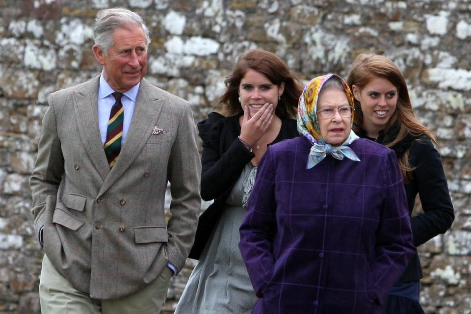 The Queen with the Prince of Wales (left), Princess Eugenie, (back left), and Princess Beatrice (back right) and the rest of the Royal family at the Castle of Mey after disembarking the Hebridean Princess boat after a private family holiday with Queen Elizabeth II around the Western Isles of Scotland (PA Archive)