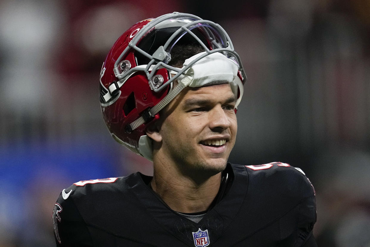 After turning to Taylor Heinicke for two weeks, the Atlanta Falcons reportedly are going back to quarterback Desmond Ridder when they play in Week 12. (AP Photo/John Bazemore)