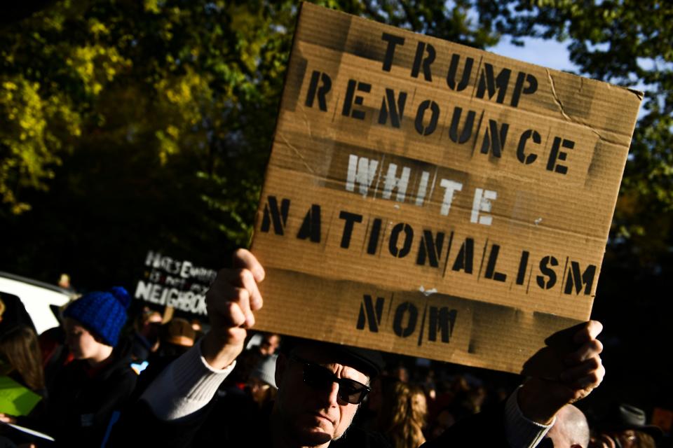 People protesting against US President Donald Trump wait near the Tree of Life Congregation on October 30, 2018 in Pittsburgh, Pennsylvania. (Photo: Brendan Smialowski/AFP/Getty Images)trump