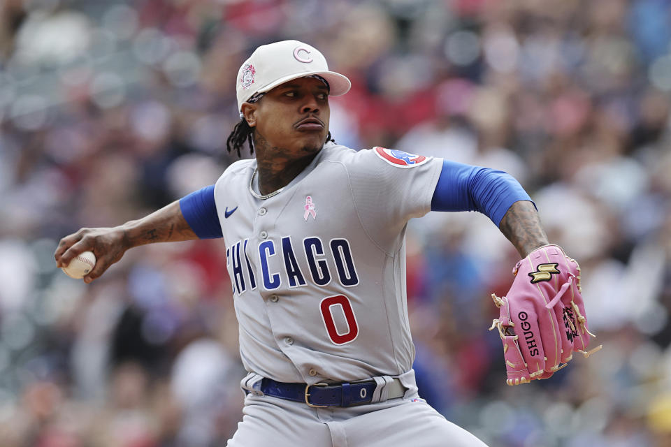 CORRECTS DATE TO MAY 14 INSTEAD OF MAY 15 - Chicago Cubs starting pitcher Marcus Stroman (0) throws during the first inning of a baseball game against the Minnesota Twins, Sunday, May 14, 2023, in Minneapolis. (AP Photo/Stacy Bengs)