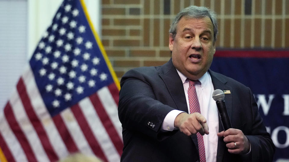 Chris Christie points as he speaks during a town hall.