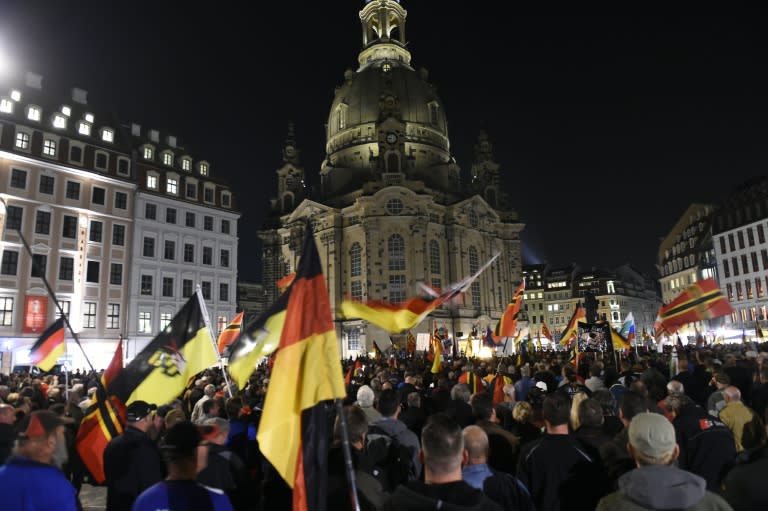 Supporters of the anti-Islam PEGIDA movement attend a protest rally on October 5, 2015 in Dresden, eastern Germany