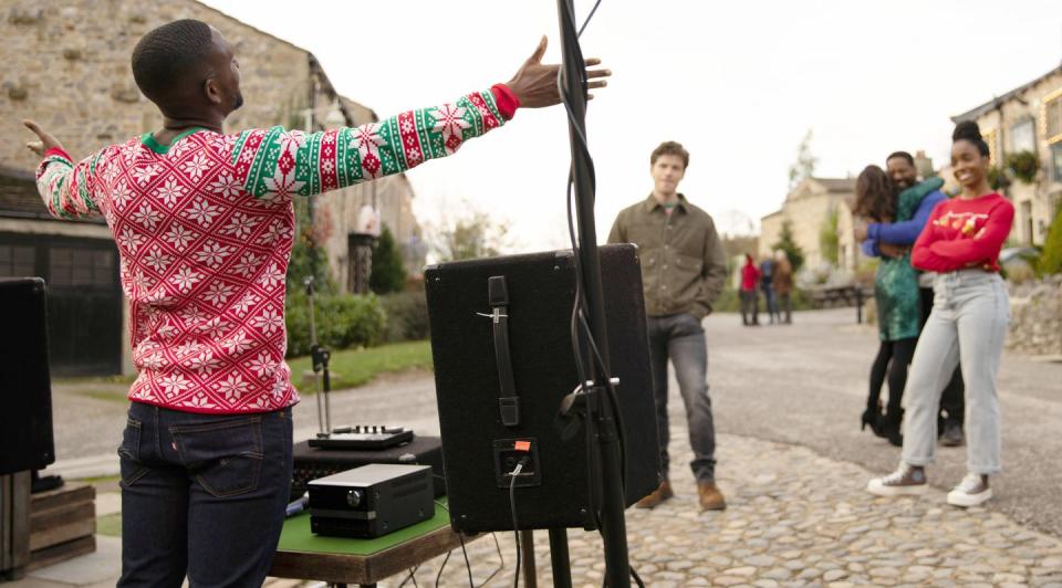 Sunday, December 25: Ethan takes the church's PA system and brings it onto the street