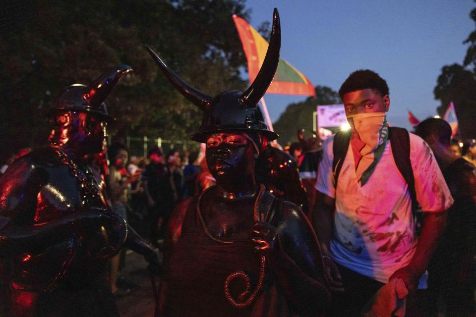 Revelers take part in J'ouvert celebration, Monday, Sept. 4, 2023, in the Brooklyn borough of New York. (AP Photo/Yuki Iwamura)