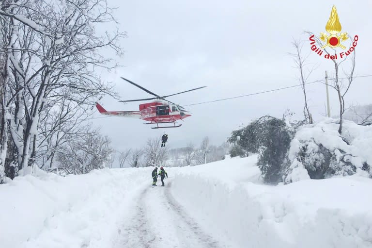 Image obtained from Vigili del Fuoco Twitter account on January 19, 2017 shows a rescue operation at the Hotel Rigopiano, near the village of Farindola on the slopes of the Gran Sasso mountain, central Italy, which was engulfed by an avalanche