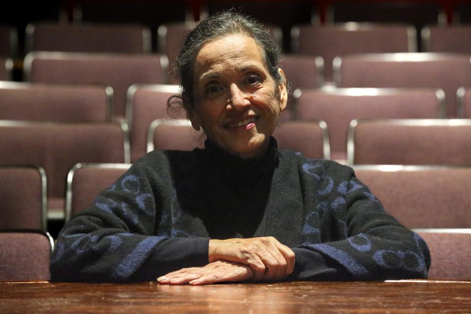 Dora Canales, managing director of Harbor Playhouse, poses inside the theater Thursday, Feb. 15, 2024.