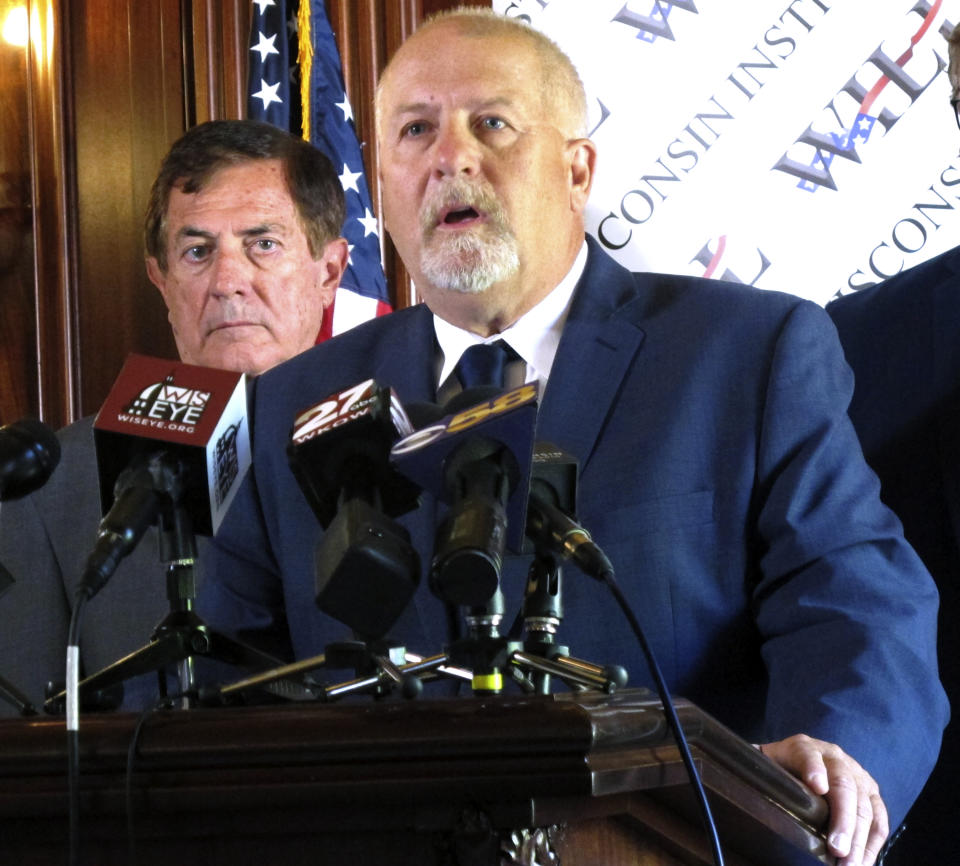 Conservative attorney Rick Esenberg details a new lawsuit asking the Wisconsin Supreme Court to overturn four partial vetoes made by Democratic Gov. Tony Evers and limit the ability of future governors to make similar vetoes during a news conference at the Statehouse in Madison, Wis., Wednesday, July 31, 2019. If successful, the move would reverse more than four decades of precedent. (AP Photo/Scott Bauer)