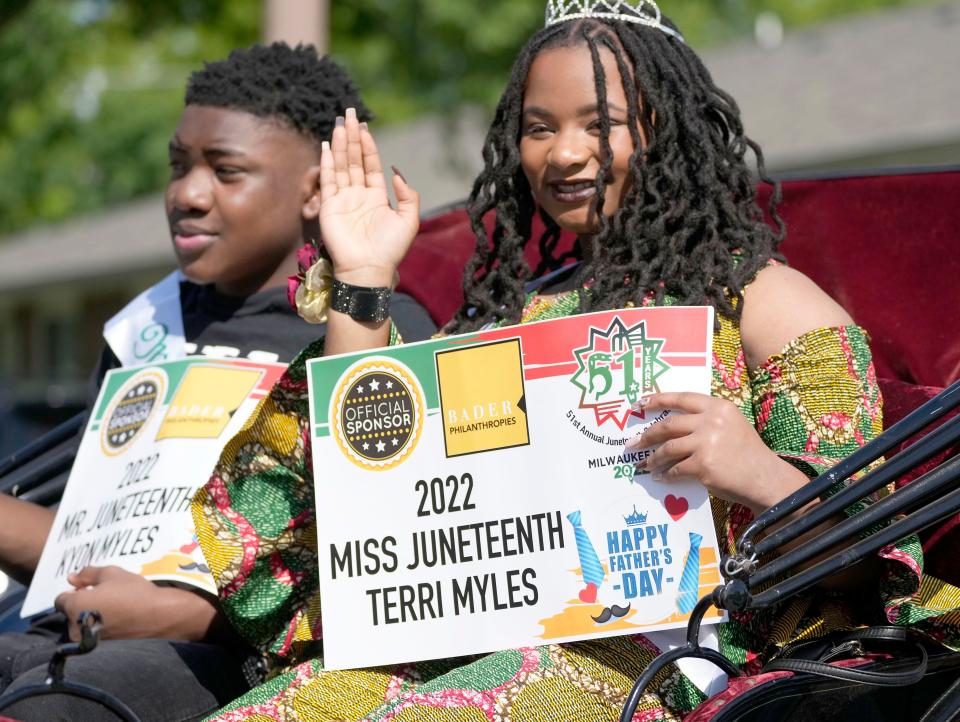 Mr. and Miss Juneteenth, Kyon and Terri Myles, ride on a float in the Juneteenth Day parade as part of the Juneteenth Day celebration in Milwaukee on Sunday, June 19, 2022. This year marked the 51st anniversary of Milwaukee's Juneteenth Day gathering, one of the oldest in the country.