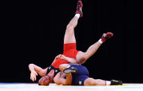 LONDON, ENGLAND - DECEMBER 10: Riza Kayaalp of Turkey turns Xenofon Koutsioubas of Greece over in the Men's 120kg Greco Roman during the Wrestling LOCOG Test Event for London 2012 at ExCel on December 10, 2011 in London, England. (Photo by Julian Finney/Getty Images)