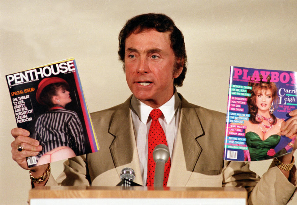 Penthouse publisher and founder Bob Guccione holds up his magazine Penthouse and Playboy magazine at a news conference announcing his anti-censorship campaign at Penthouse magazine offices in New York, June 4, 1986.  (AP Photo/Richard Drew)