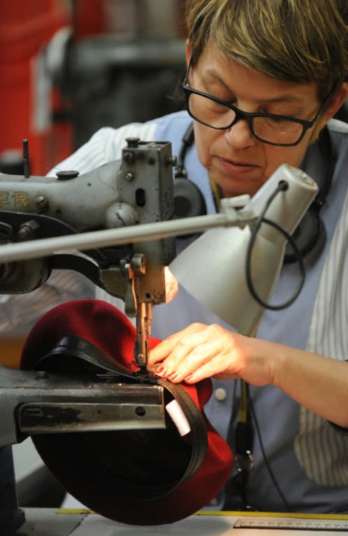 An employee works on a beret at Laulhere factory in Oloron Sainte-Marie, in the French Basque region of southwestern France, on May 19, 2016