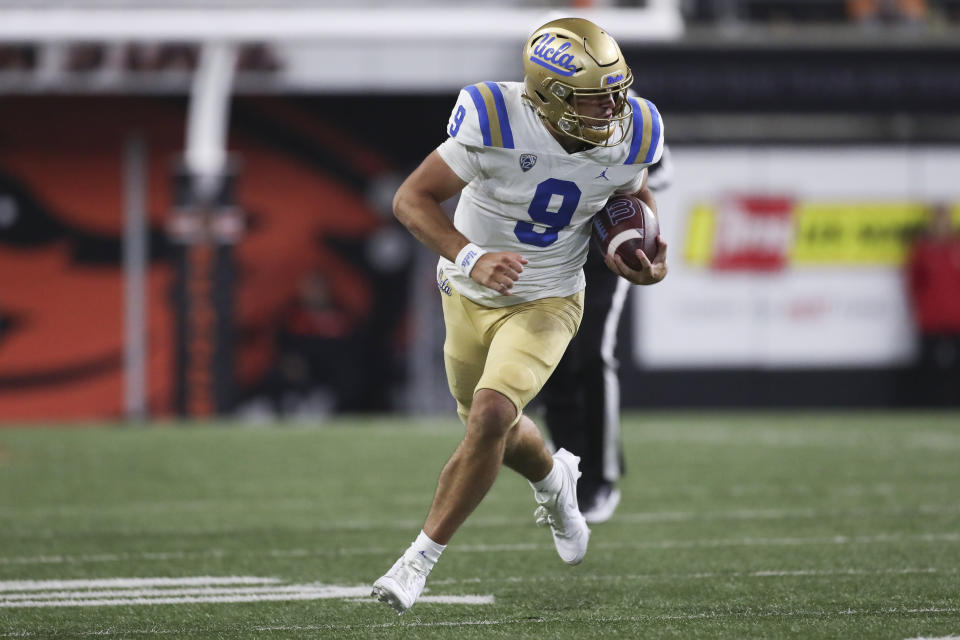 UCLA quarterback Collin Schlee (9) runs against Oregon State during the second half of an NCAA college football game Saturday, Oct. 14, 2023, in Corvallis, Ore. (AP Photo/Amanda Loman)