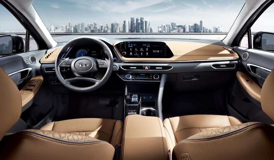 Inside, the Sonata has upscale features and an elegant-looking dashboard sweep.