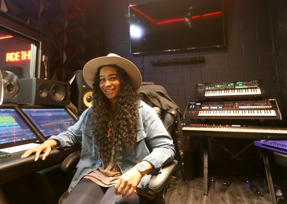 Micki Miller, singer/songwriter/producer, sits in her music production area Monday, Sept. 26, 2023, in the South Bend studio.