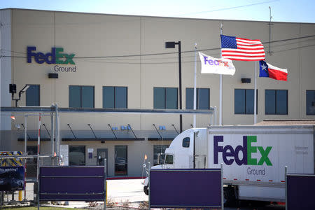 A FedEx truck is seen outside FedEx facility following the blast, in Schertz, Texas, U.S., March 20, 2018. REUTERS/Sergio Flores