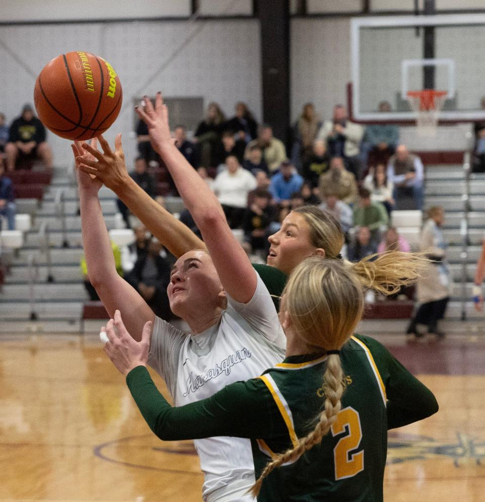 Squad Hope Masonius reaches for a rebound. Red Bank Catholic vs Manasquan in SCT Girls Basketball Semifinal on February 15, 2024 in Red Bank. NJ.