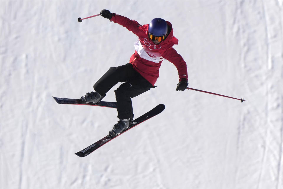 China's Eileen Gu competes during the women's slopestyle qualification at the 2022 Winter Olympics, Monday, Feb. 14, 2022, in Zhangjiakou, China. (AP Photo/Francisco Seco)
