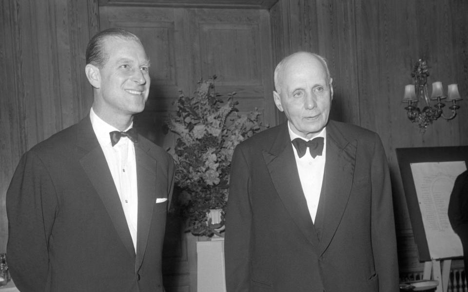 The Duke of Edinburgh, who had been a pupil at Gordonstoun, meeting his old headmaster, Dr. Kurt Hahn, at a dinner given in the doctor's honour by The Friends of Gordonstoun on June 4, 1964 - PA