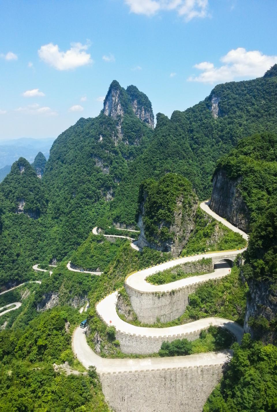 <p>The Tianmen Mountain Road in Hunan, China, is known for its extreme curves along the mountainous route. The road is situated within Tianmen Mountain National Park, a forest in southwest China.</p>