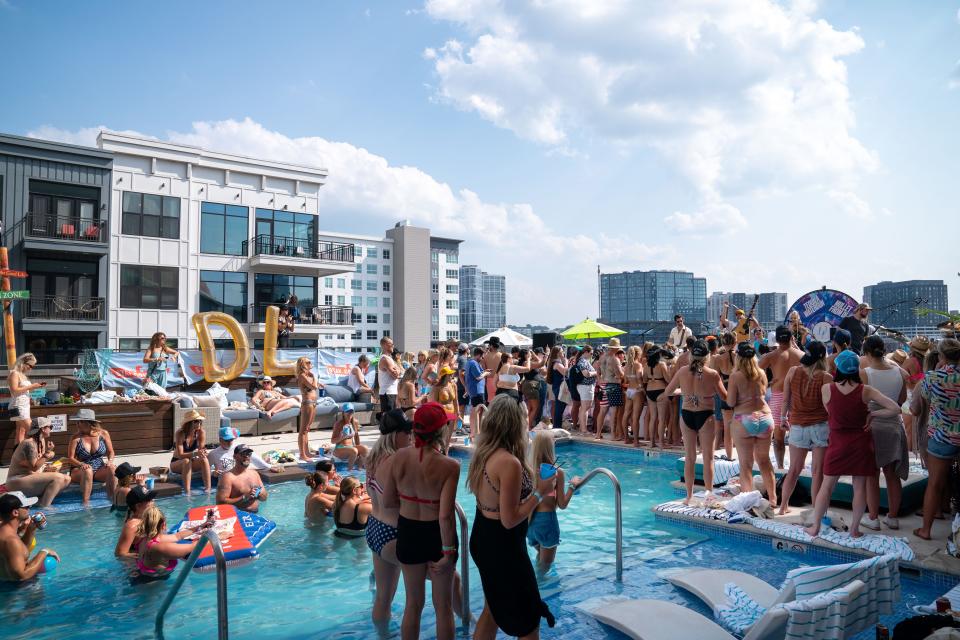 Dustin Lynch performs at his "Pool Situation" party at the Margaritaville Hotel on the third day of CMA Fest in Nashville, Tenn., Saturday, June 10, 2023.