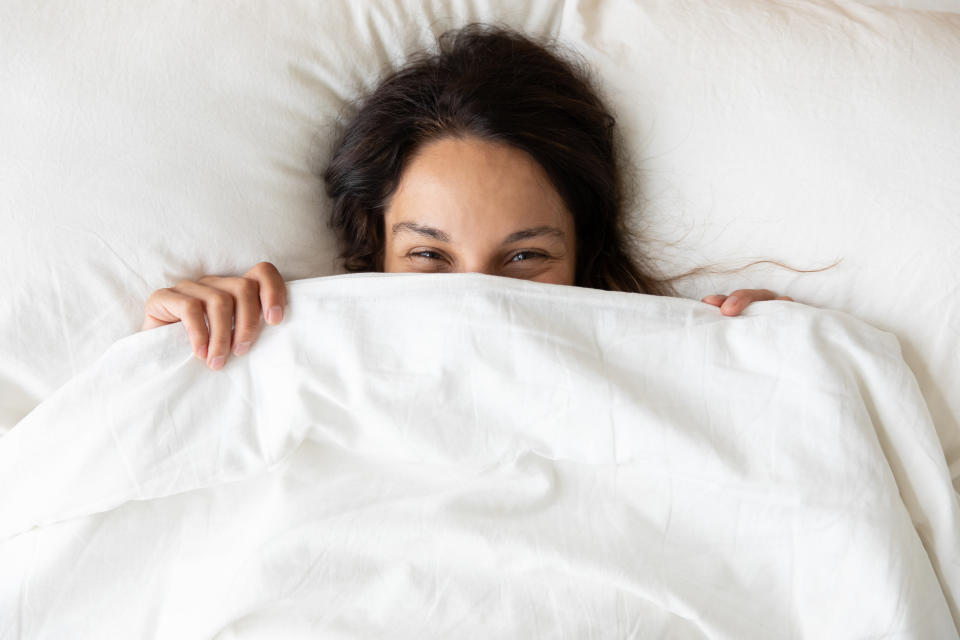 These weighted blankets won&rsquo;t <i>weigh</i> down your wallet &mdash; they&rsquo;re on sale for Prime Day 2020.  (Photo: fizkes via Getty Images)