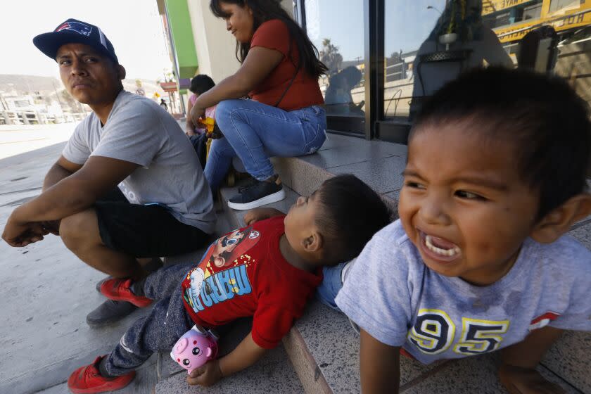 Tijuana, Mexico-Aug. 11, 2022-Samuel Quinoz, age 27, recently arrived in Tijuana from Oaxaca, Mexico, is hoping to get his child and partner to the United States. He was deported from the U.S. five year ago. He and his child, and other family members have no place to stay in Tijuana while they figure out the system. (Carolyn Cole / Los Angeles Times)