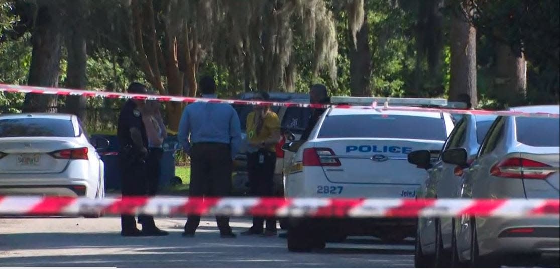 Jacksonville police investigate the death of a 8-month-old girl on Tuesday outside a home on Newberry Road when she was left alone in a hot car for an hour.