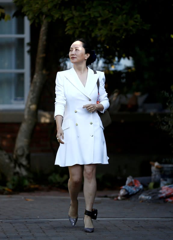 FILE PHOTO: Huawei Technologies Chief Financial Officer Meng Wanzhou leaves her home to appear in British Columbia supreme court in Vancouver