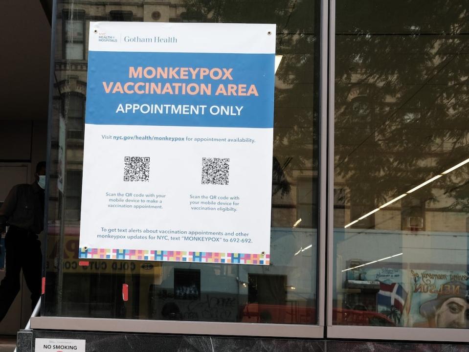 A sign outside of a New York clinic reads "appointment only"