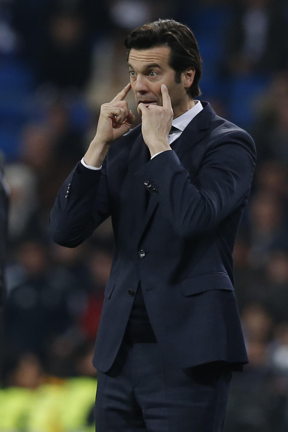 Real Madrid's coach Santiago Solari gestures during a Spanish La Liga soccer match between Real Madrid and Real Sociedad at the Santiago Bernabeu stadium in Madrid, Spain, Sunday, Jan. 6, 2019. (AP Photo/Paul White)